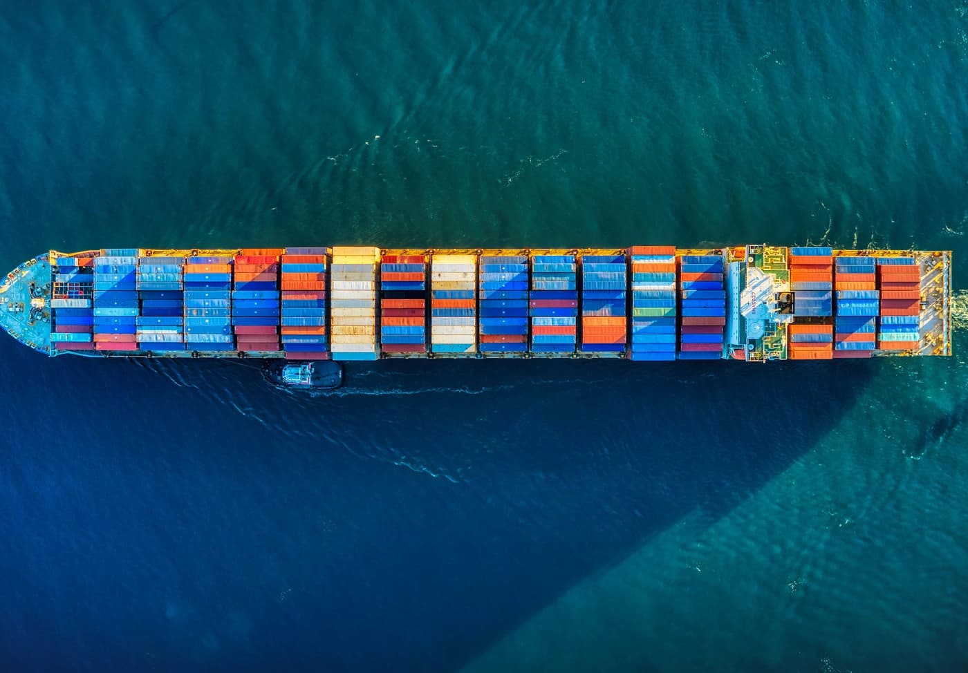 Cargo ship navigating across the ocean