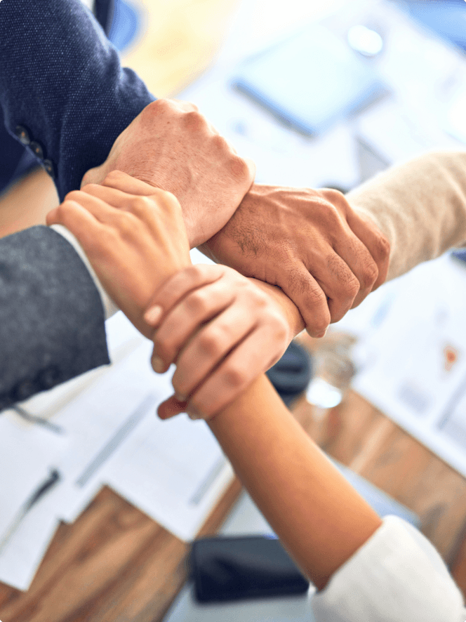 Business team hands joined together